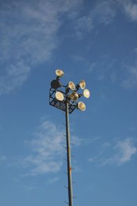 Low angle view of street light against sky