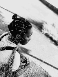 High angle view of woman on footpath