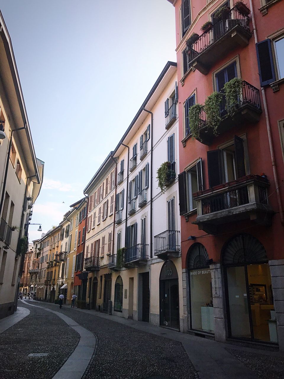 architecture, street, building exterior, window, built structure, sky, city, outdoors, no people, day