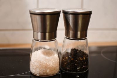 Close-up of coffee and glass on table