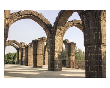 View of colonnade against clear sky