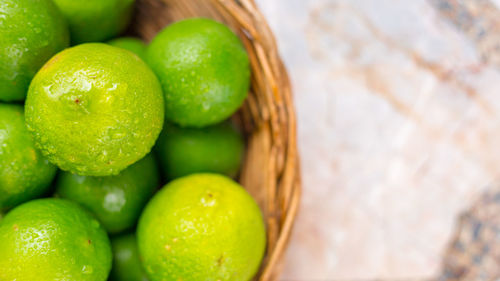 Close-up of green fruits on table