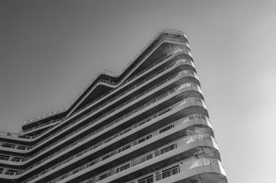 Low angle view of modern building against clear sky