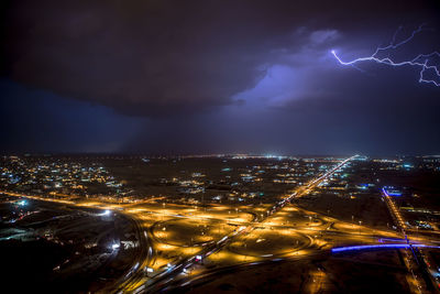 Aerial view of illuminated cityscape