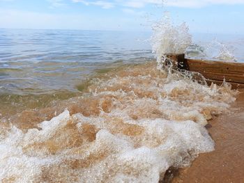 Waves splashing on shore