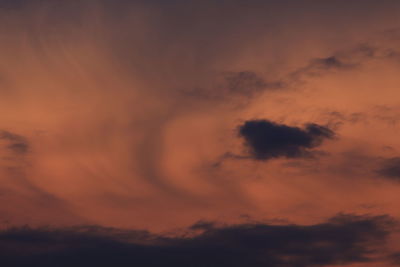 Low angle view of dramatic sky during sunset