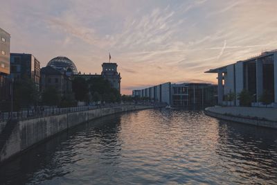 View of reichstag in berlin against sky at sunset