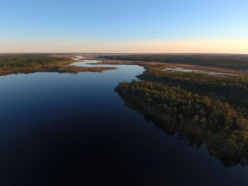 Scenic view of lake against clear sky