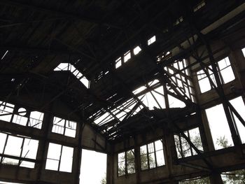Low angle view of ceiling of abandoned building