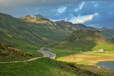 Scenic view of landscape and mountains against sky