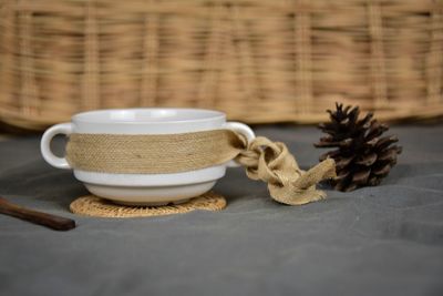 Close-up of coffee cup on table