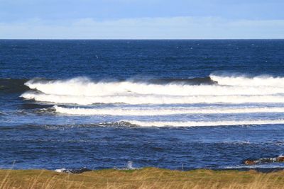 Waves splashing on rocks