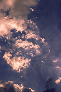Low angle view of clouds in sky during sunset
