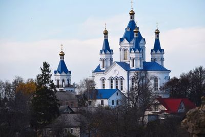 View of cathedral and buildings against sky