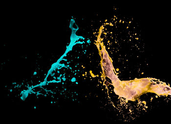 Close-up of splashing water against black background