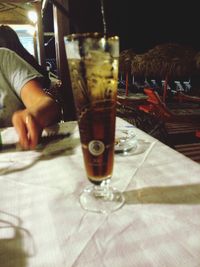 Close-up of beer glass on table