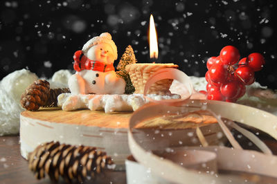 Close-up of christmas decorations on table