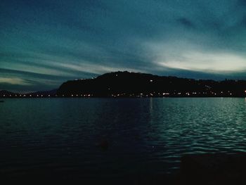 Scenic view of sea against sky at night