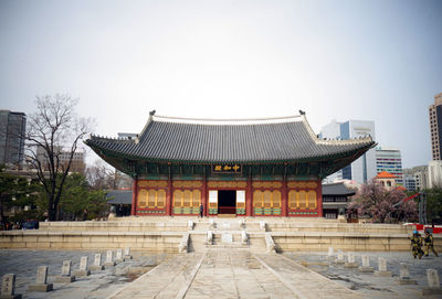 View of temple building against clear sky