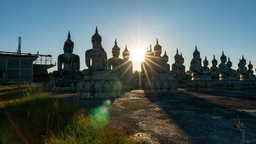 Panoramic view of buildings against sky during sunset