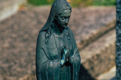 Close-up of statue against blurred background