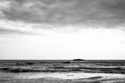 Scenic view of sea and cloudy sky