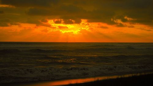 Scenic view of sea against sky during sunset