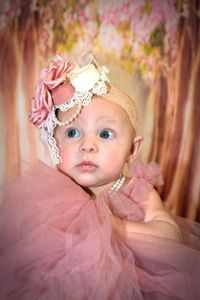 Portrait of smiling baby wearing hijab