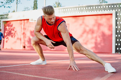 Low section of woman exercising in gym