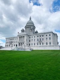 State building against cloudy sky in boston