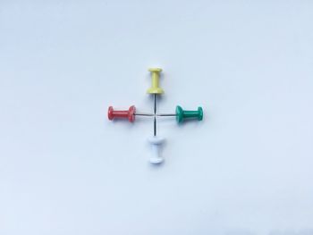 Close-up of toy over white background