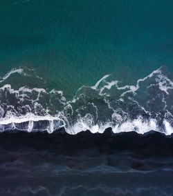 Scenic view of sea waves rushing towards shore