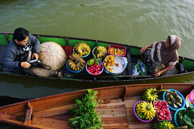 High angle view of man sitting on boat