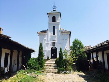 Exterior of glozhene monastery against clear sky