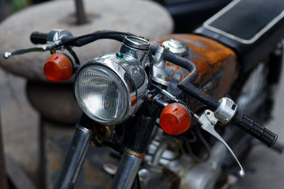 Close-up of motorcycle parked