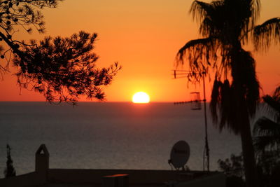 Scenic view of sea at sunset