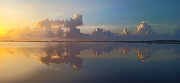 Scenic view of sea against sky at sunset