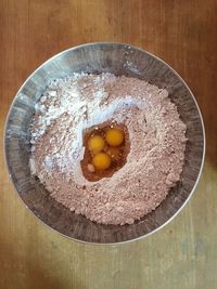 Directly above shot of bread in bowl on table