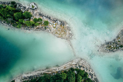 High angle view of waves on shore