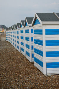 Beach huts against sky