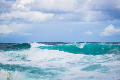 View of sea wave against sky