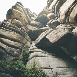 Close-up of rock against sky