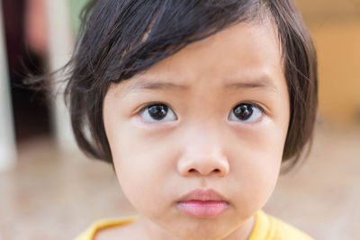 Close-up portrait of cute girl