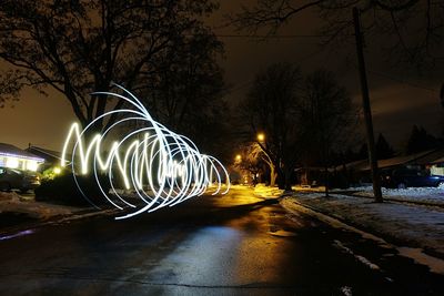 Light trails on road at night