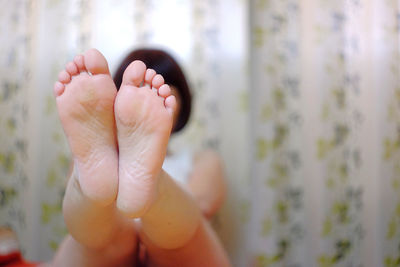 Low section of baby feet