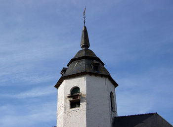 Low angle view of building against blue sky