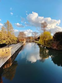 Scenic view of lake against sky during autumn