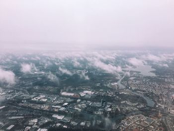 Aerial view of cityscape against sky