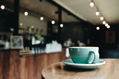 Close-up of coffee cup on table in cafe