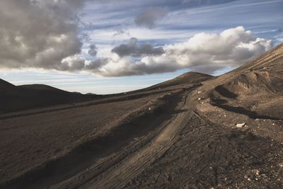 Scenic view of desert against sky